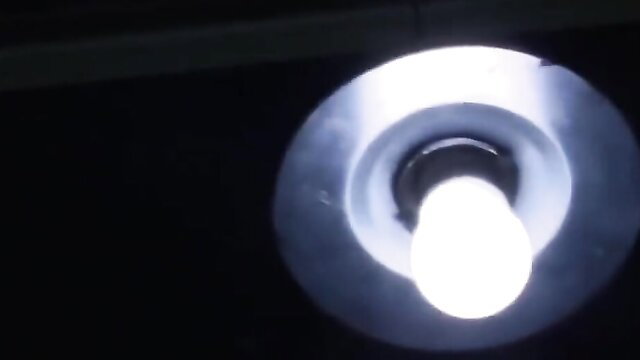 Bright bulb in close-up BDSM sex experiment setup, JAV girl training
