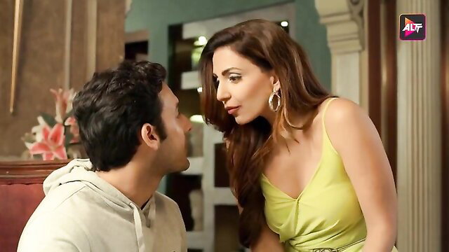 Indian beauty in yellow dress teases guy in intimate closeup