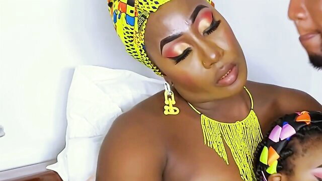 Thick ebony African mom with child, topless big tits and booty tease