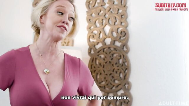 Dee Williams in tight pink dress, deep cleavage tease