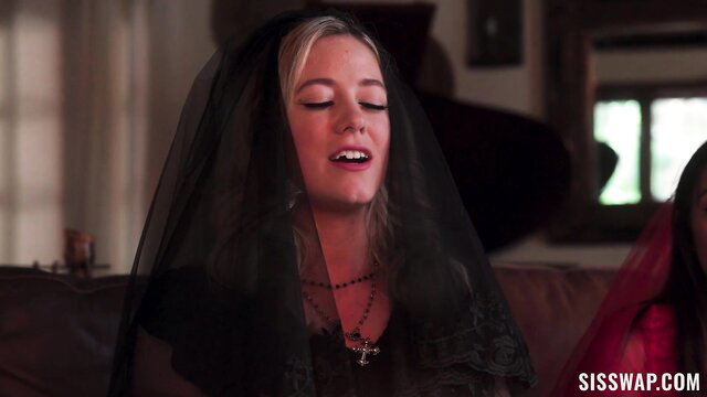 Blonde River Lynn in black veil moans with Amber Summer in red