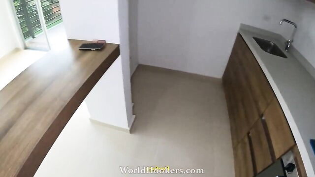 Sexy real estate advisor in modern kitchen, teasing fuck fantasy