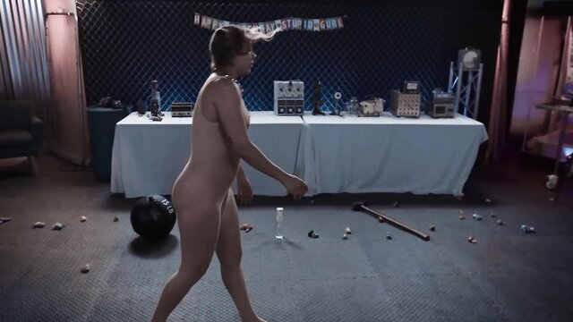 Nude blonde walking nude in sex toy party scene