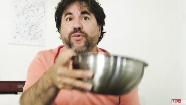 Rachael Cavalli holds bowl in kitchen with stepson MILF preview