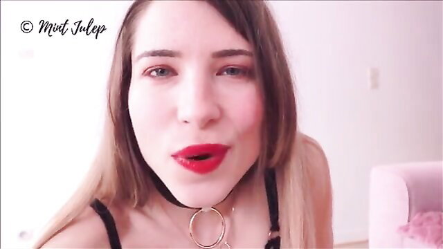 Mint Julep pouts red lips in choker lingerie, seductive closeup