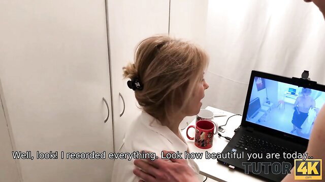 Blonde MILF tutor shows recorded nude video on laptop, coerced by man