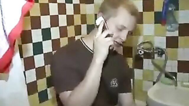 Blonde guy on phone in bathroom, amateur cuckold setup