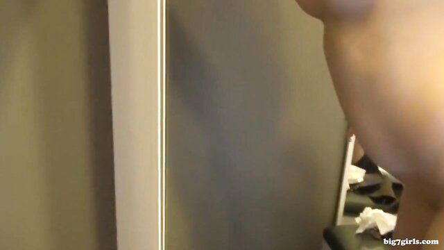 Blonde fucked in H&M changing room, big tits and ass exposed