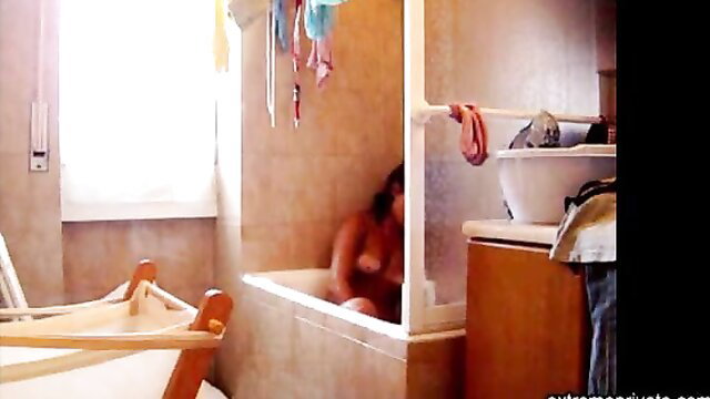 Hairy stepdaughter bathing nude in tub like her mom