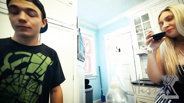 Blonde MILF stepmom sips wine with young stepson in kitchen sex fantasy