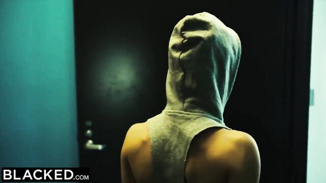 Nicole Aniston in gray tank top hoodie, back view at door, Blacked IR