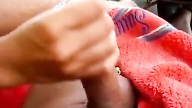 Closeup handjob on thick black cock with towel in car, public amateur
