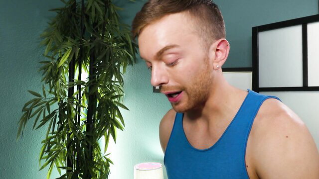 Hunk Dalton Riley shirtless in tank top, closeup face surprised expression