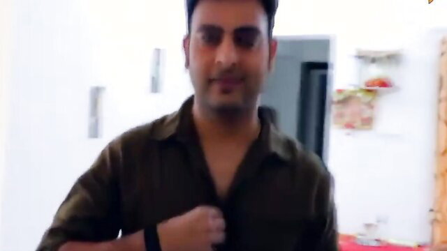 Indian man in open shirt smiling seductively, Ullu Garam Masala tease