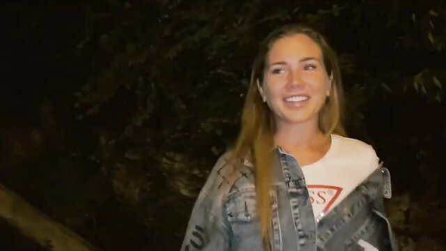 Mary Rock smiling outside at night