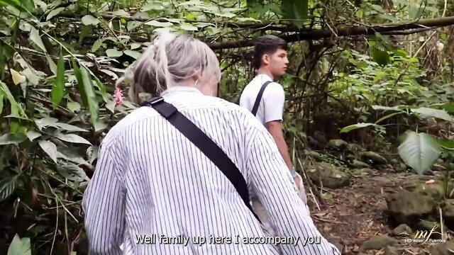 Monique Fuentes with young guy in jungle, outdoor stepmom tease