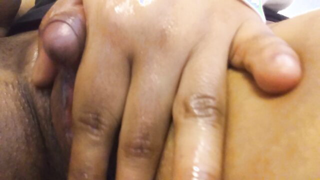 Black goddess stroking huge swollen clit closeup to orgasm