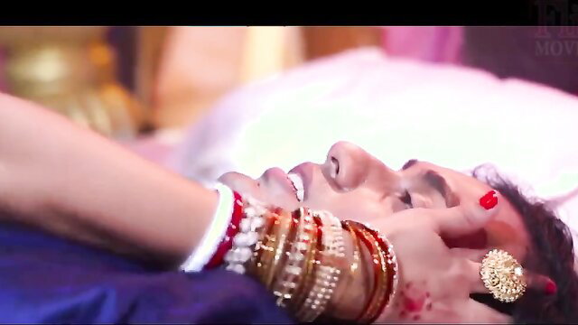 Busty Indian bride in bridal bangles grabs groom's face in femdom wedding tease