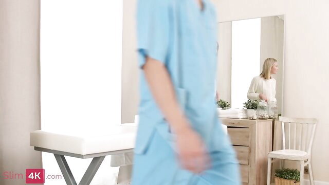 Polly White in blue scrubs with masseur in Slim4K massage sex