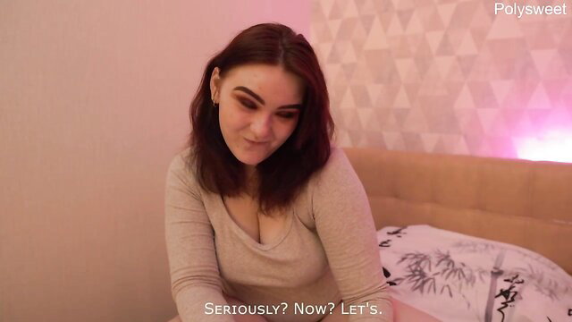 Hot brunette in tight sweater on bed, teasing gaze in amateur BJ scene