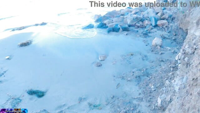 Stepmom and stepson cheat on sunny beach with rocks and water