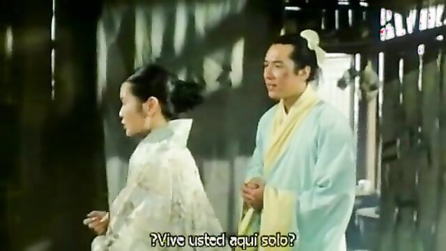 Sexy skinny Chinese couple in traditional silk robes, vintage bedroom tease