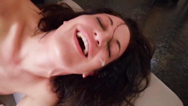 Kissa Sins laughing in ecstasy during intense anal sex closeup