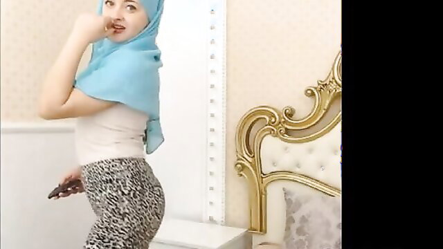 Hot Arab nympho in hijab teases with leopard pants and toy