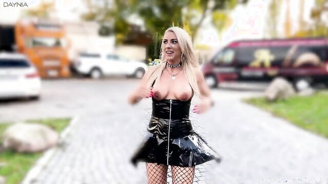 Blonde in latex mini dress & fishnets dances publicly at VENUS Messe Berlin