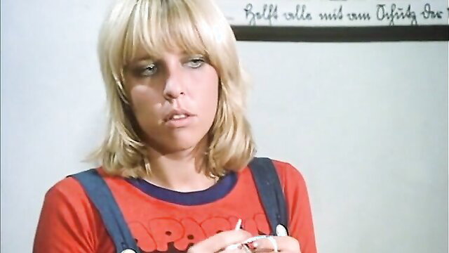 Vintage blonde German beauty in red overalls from classic porn