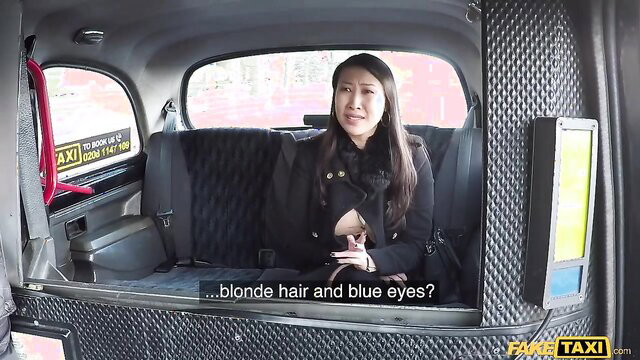 Sharon Lee with blonde hair blue eyes in Fake Taxi, exotic beauty closeup