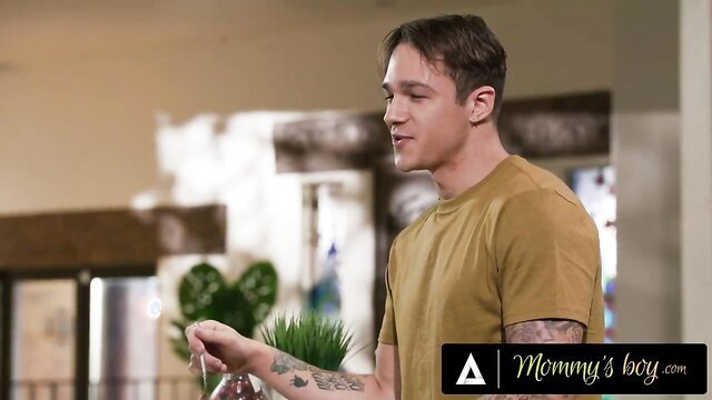 Tattooed guy in yellow tee from Mommy's Boy adult video with Siri Dahl