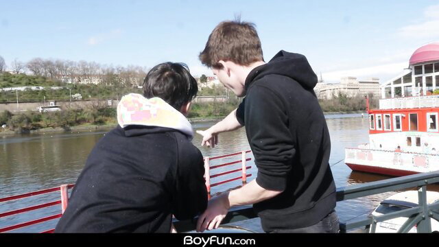 Twink Josh Cavalin points at river with Colombian Justin Host