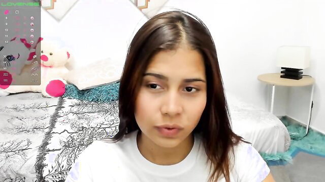 Hot curvy Latina babe in tight white tee on webcam