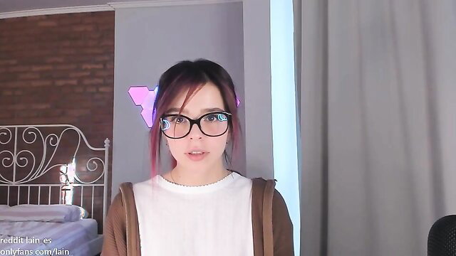 Cute Asian teen in glasses and cardigan toys pussy with dildo