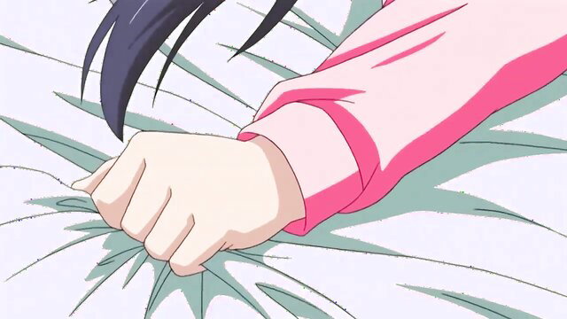 Busty anime cutie clenching fist in pink sleeve on bed