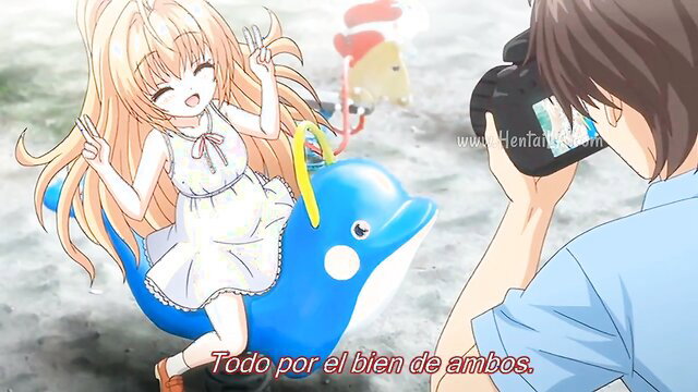 Cute blonde anime girl smiling on inflatable dolphin toy beach photoshoot