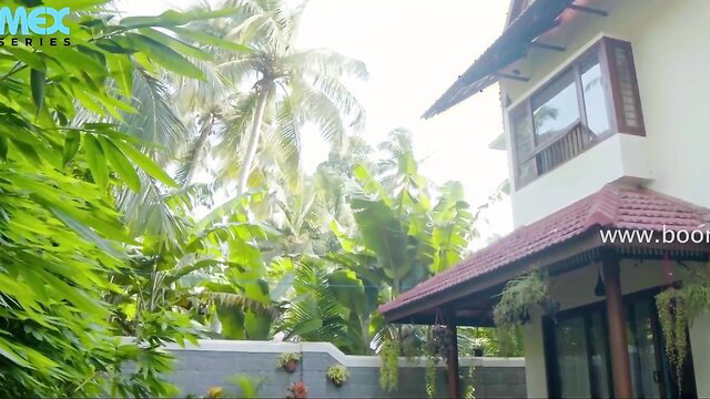 Tropical Kerala house exterior with lush palms, no nudity visible