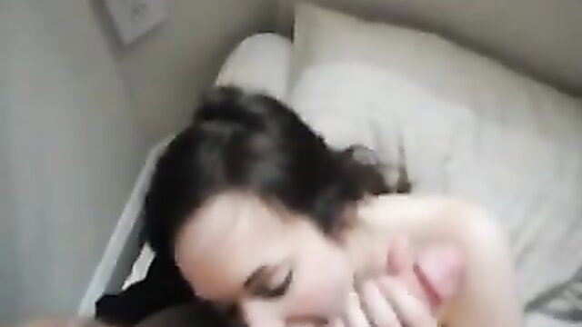 Brunette GF deepthroats massive dick on bed, amateur blowjob