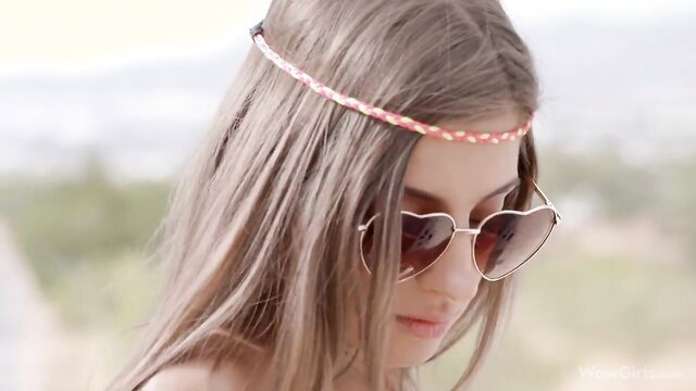 Melena Maria Rya in heart sunglasses and headband, hot solo tease