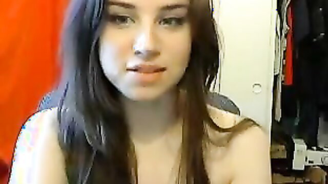 Hot college babe with perky tits bares shoulders in bedroom tease