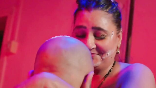 Hot Desi babe hugs shaved head stud intimately, big tits pressed close