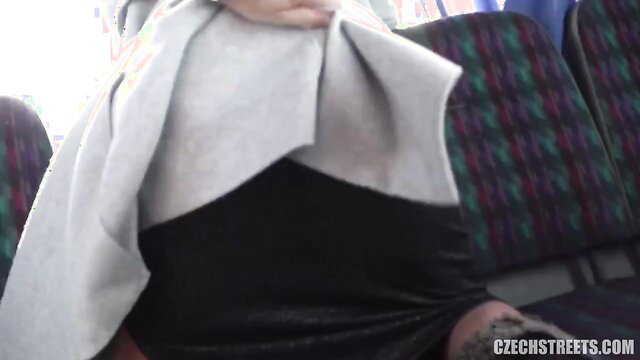 Letty's huge tits exposed under coat on public bus POV