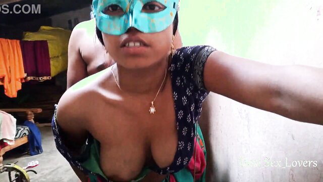 Desi village MILF in mask shows huge natural tits closeup
