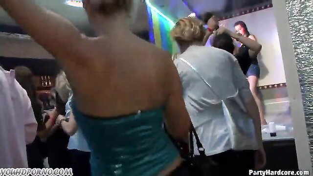 Crowded club party with hot blondes in tight dresses dancing