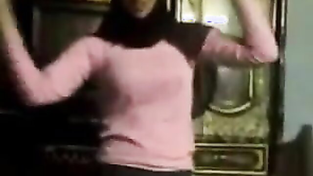 Arab babe in pink sweater and hijab flaunts curves in homemade video