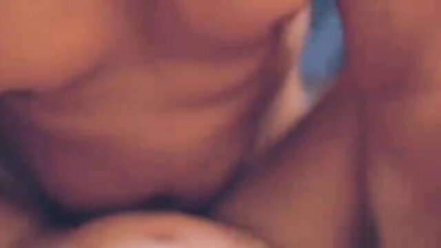 Blurry closeup of woman's big tits in blue lingerie, rough sex tease