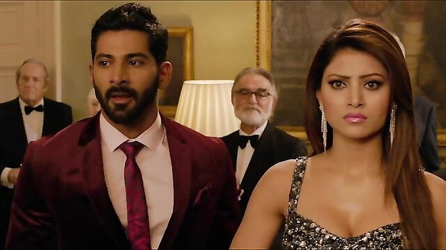 Indian couple in elegant attire at glamorous event, hate story passion