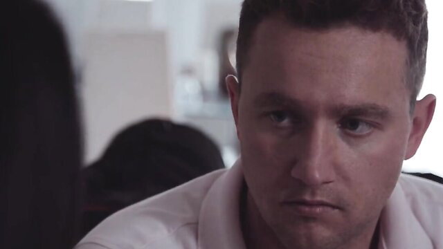 Van Wylde stares intensely in Milfed living room scene