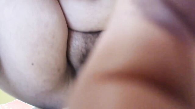 Big-titted babe's huge pale boobs and shaved pussy closeup